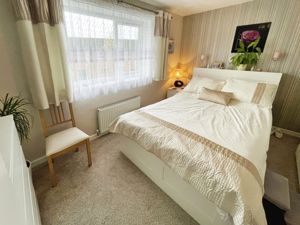 Bedroom One- click for photo gallery